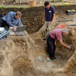 Archaeologist laser scanning the postholes at Bluehenge 