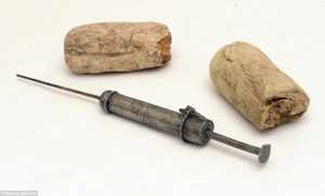 Mercury syringe and field bandages