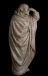 Mourner holding back tears, alabaster, carved 1494