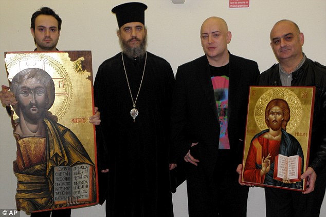 From the left: Church functionary holds icon, Bishop Porfyrios, Boy George, John Themis holds a contemporary painting, gift from Church of Cyprus