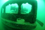 A view through the rails at the bow of A.J. Goddard shows the windlass used to raise and lower the steamer’s anchors.