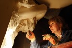 Worker restores 19th c. statue inside Bolshoi