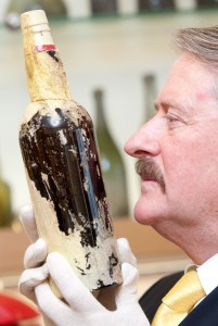 Master Blender Richard Paterson looks at a bottle of Shackleton's whisky like he's about to make sweet, sweet love to it