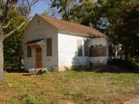 Boarded up schoolhouse in 2011