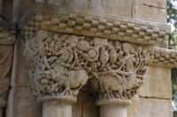 Detail of double capital with human figures, boars