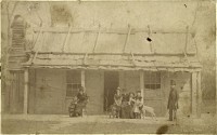 Ellen Kelly (third from the left, seated) at the family homestead after her release from prison in 1881