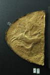 Embossed gold application with motif of animal combat of Levantine origin. Photo by Christian Eckmann; Copyright: RGZM, DAI Cairo and University of Tübingen.