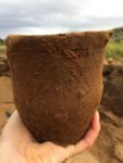 Beaker pot recovered from cist. Photo by AOC Archaeology.