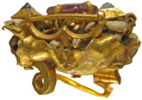 Brooch before conservation, side view. Photo courtesy Portable Antiquities Scheme.