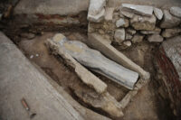 14th c. anthropoid lead sarcophagus found under spire of Notre-Dame. Photo by AFP.