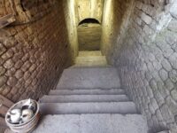 Underground vaulted passageway used by spectators to reach their seats. Photo courtesy Soprintendenza Archeologia, Belle Arti e Paesaggio per le province di Pisa e Livorno.