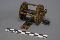 Brass fishing reel from Second Lieutenant Henry Dundas Le Vesconte's cabin. Photo courtesy Parks Canada.