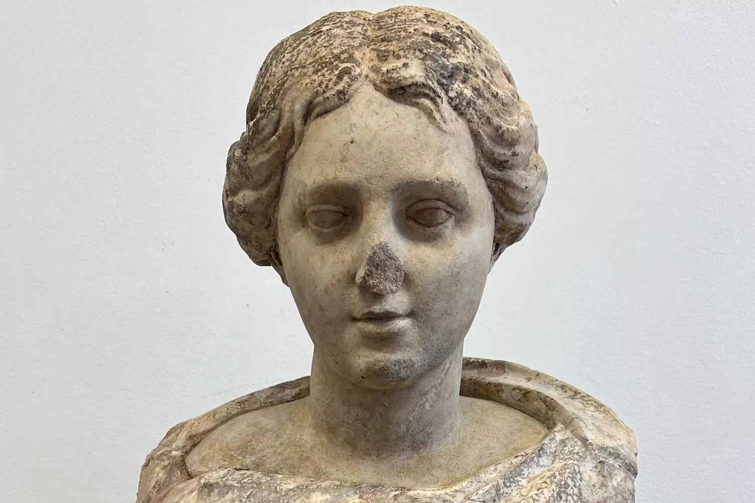 Roman marble bust found under Burghley parking lot