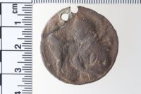 Saint Anthony with second hole punched after the first wore. Photo: Cantonal Archaeology, © Canton of Aargau