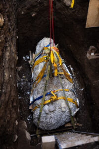 Grave removed whole in a soil block for laboratory excavation. Photo courtesy National Directorate of Cultural Heritage.