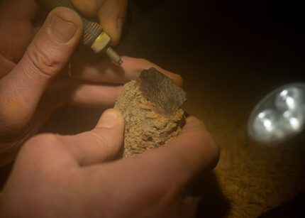 Micro-sandblasting of iron object. Photo courtesy Emmanuelle Collado, Inrap