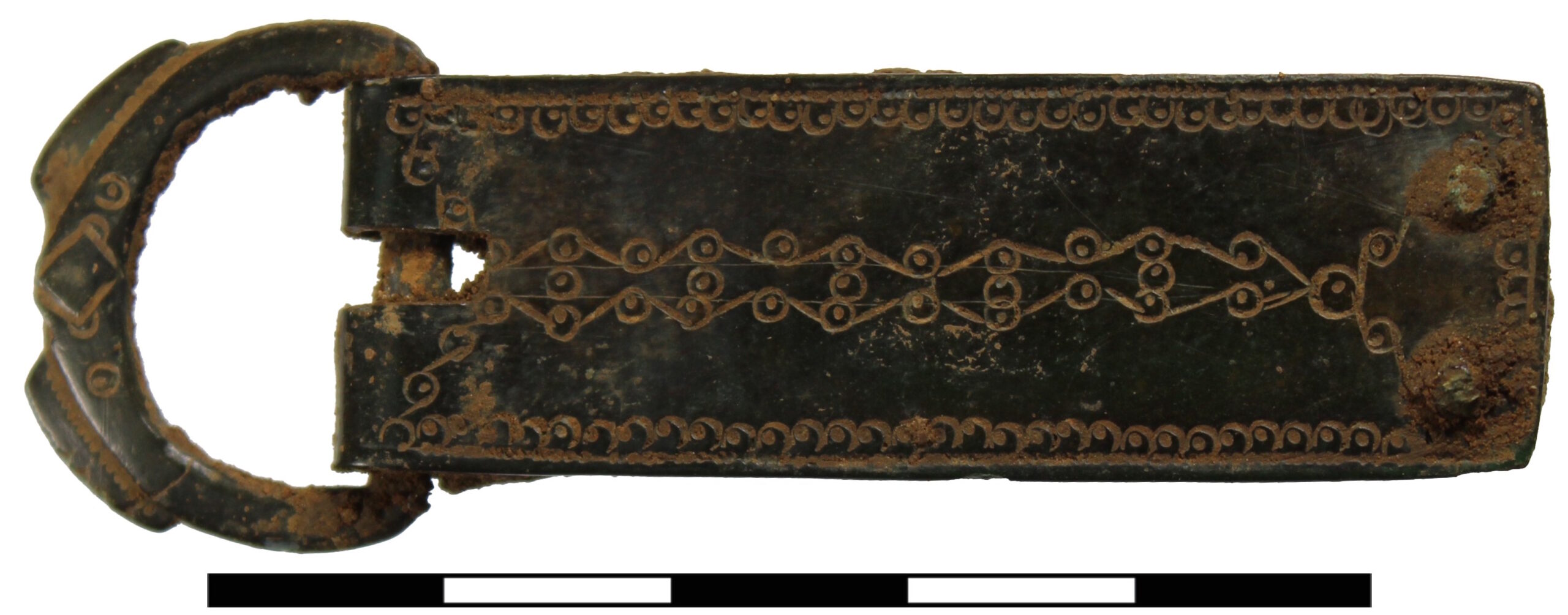 Copper-alloy belt buckle with decorated plate. Photo courtesy Archaeological Research Services Ltd.