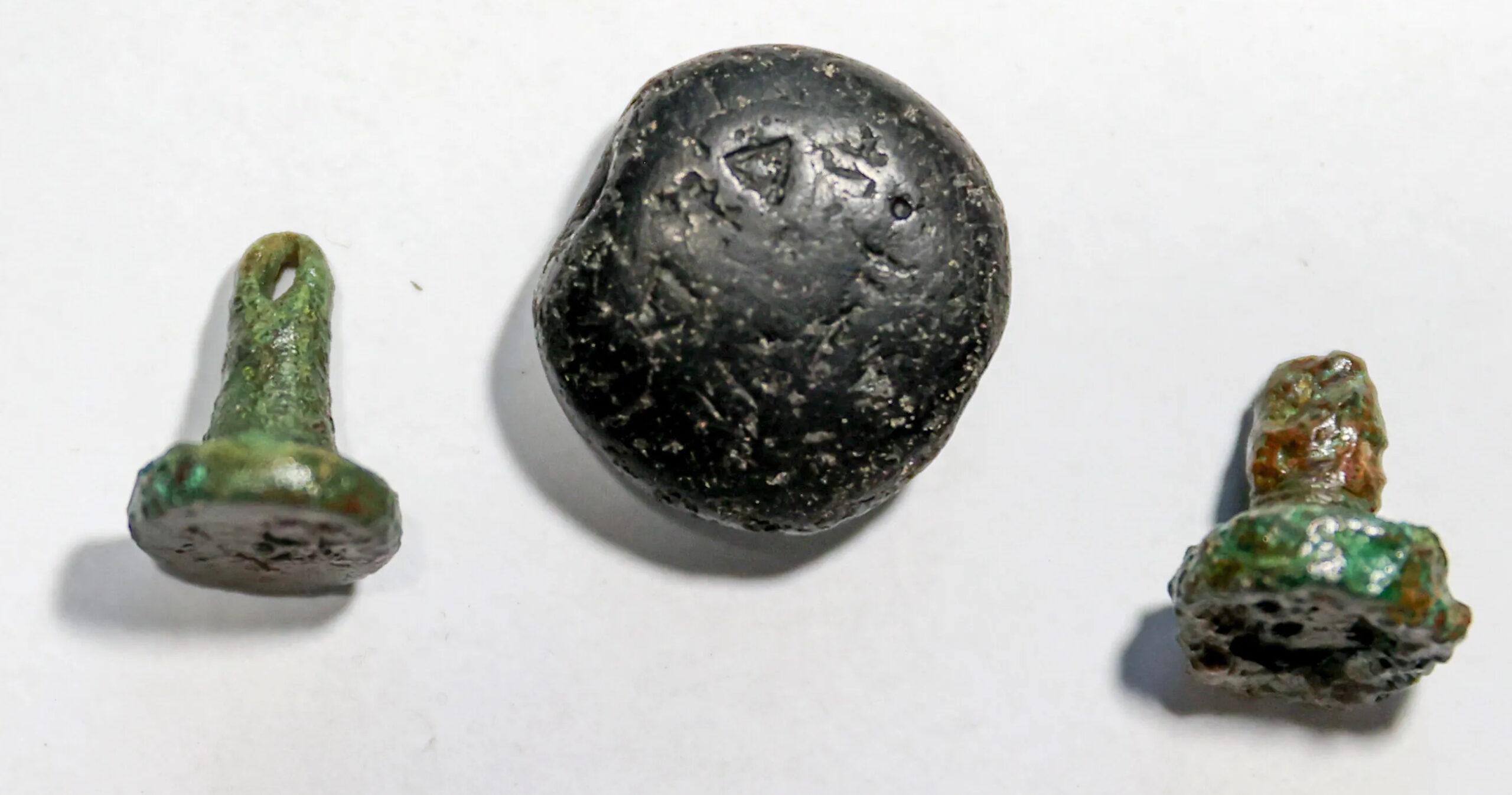 Stone and copper seals. Photo courtesy Andalou Agency.