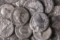 Heavily worn coin whose value was subsequently confirmed with a countermark (right). Photo courtesy Marcel Zanjani/LVR Office for Archaeological Heritage Management in the Rhineland.
